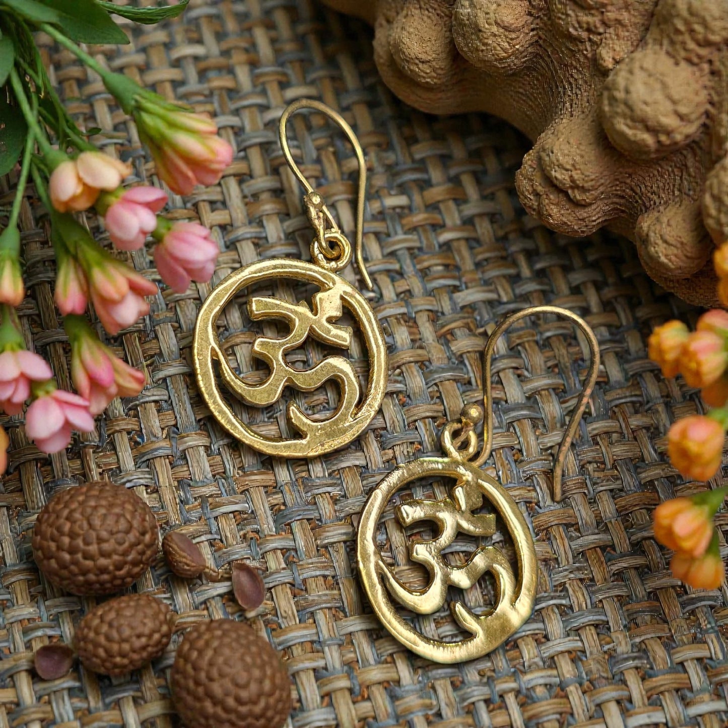 om brass earrings