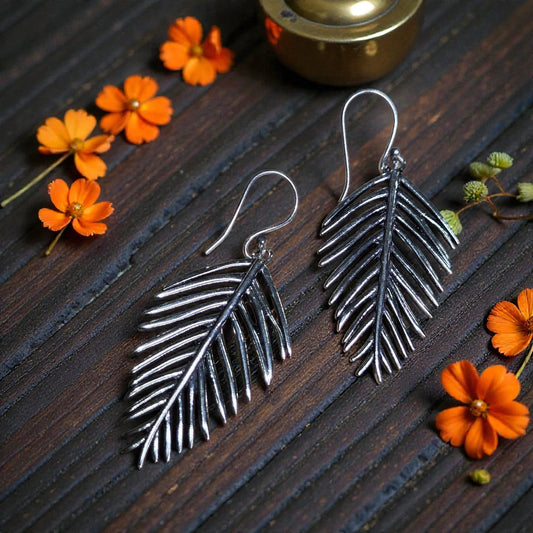 leaf themed pendant earrings
