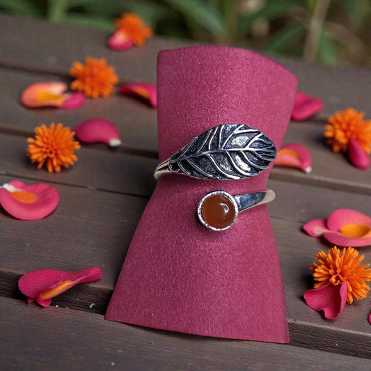 Steel ring with red stone