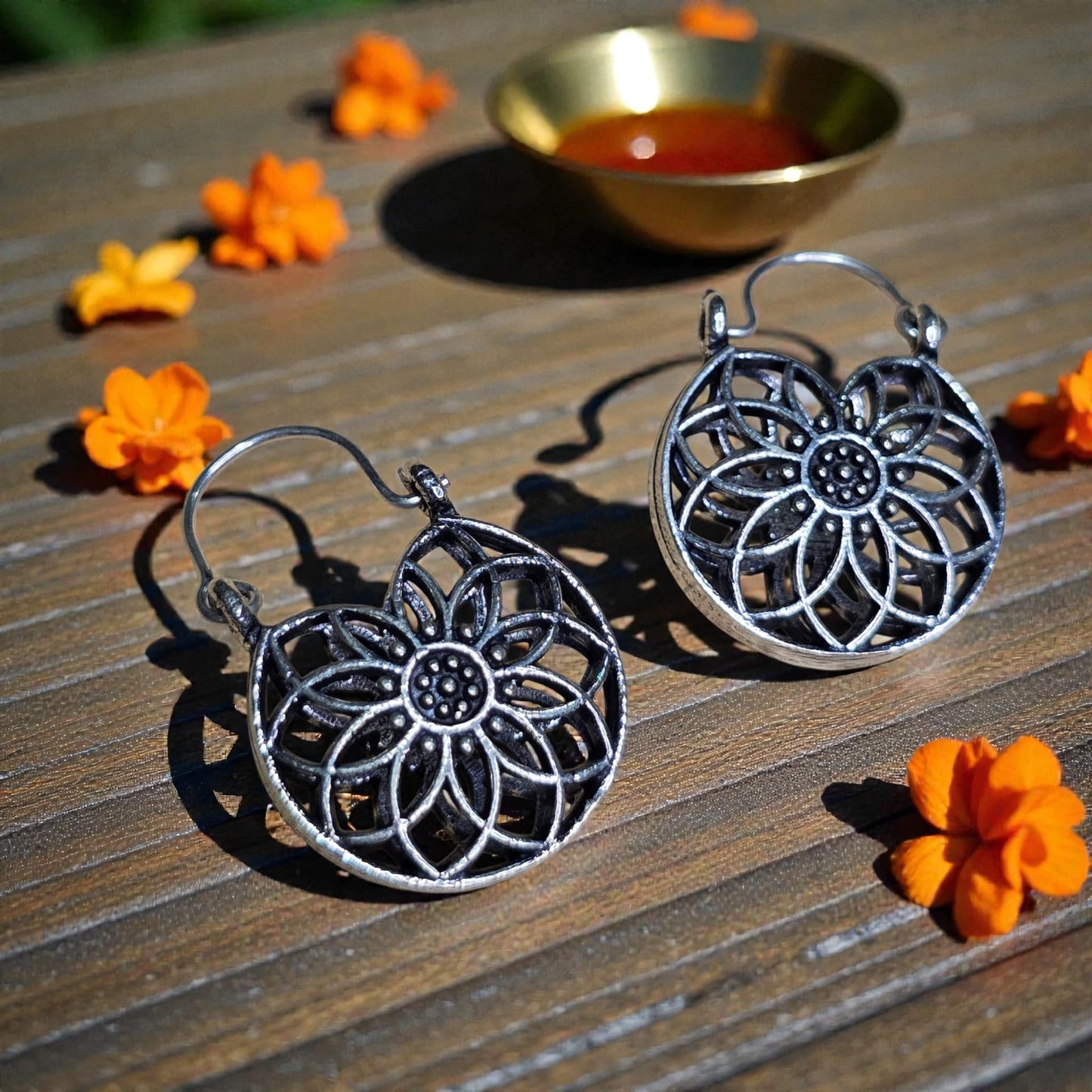 Earrings with flower themed