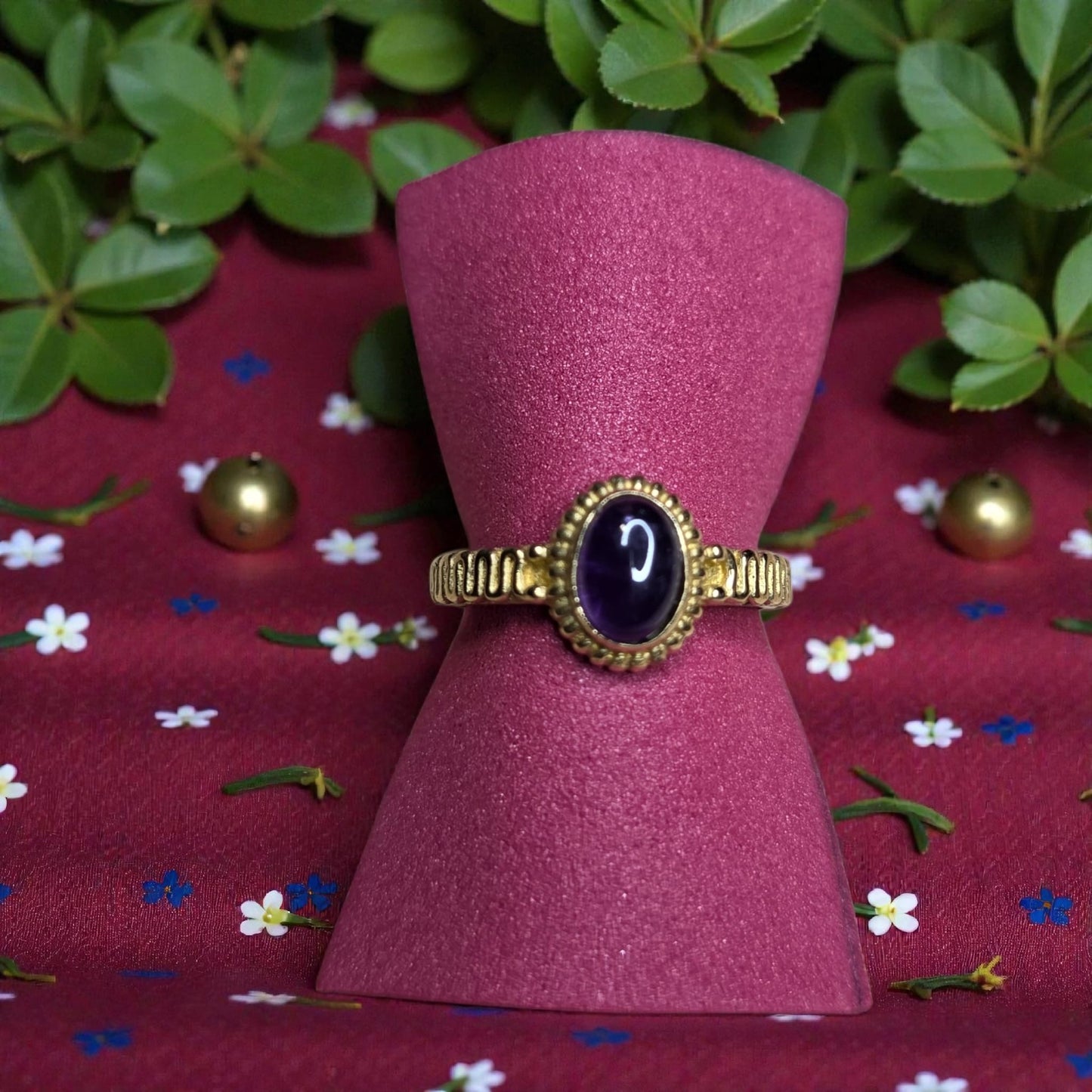 Brass ring with granat stone